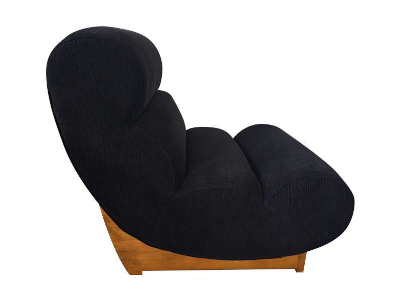 Serino black textured lounge chair with reclined profile and wood frame