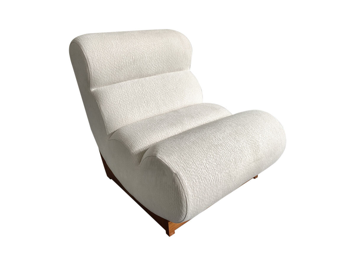 Serino ivory textured lounge chair with reclined profile and wood frame