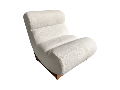 Serino ivory textured lounge chair with reclined profile and wood frame