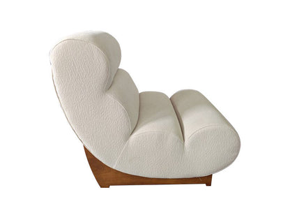 Serino ivory textured lounge chair with reclined profile and wood frame