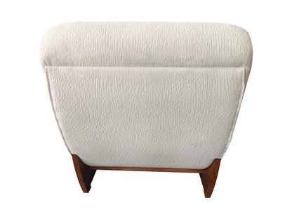 Serino ivory textured lounge chair with reclined profile and wood frame